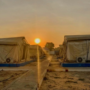 Sunset at the humanitarian hub in Monguno, Borno State, Nigeria. Photo by: Eric DeLuca, Translators without Borders