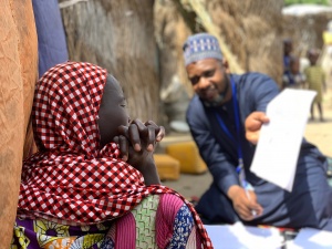 Yahaya Tijani (TWB Kanuri Team Lead) conducting comprehension research. GGSS camp, Monguno, Borno State, Nigeria. Photo by: Eric DeLuca, Translators